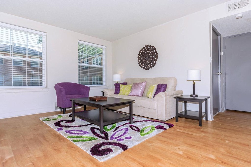 a living room with a couch and a table