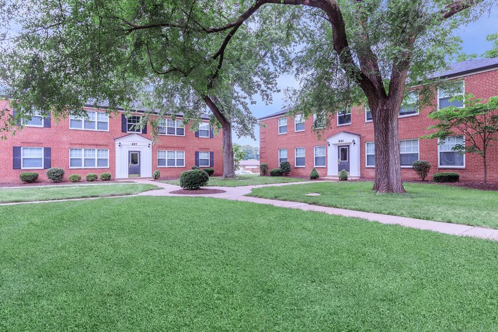 our apartments are located in a quiet neighborhood with green grass
