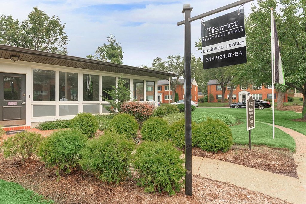 the front of a building with a sign