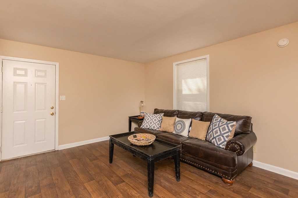 a living room with a couch and a coffee table