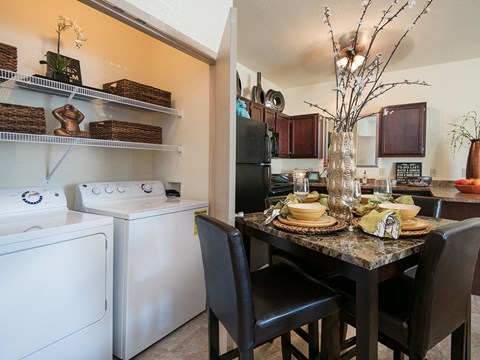 our apartments have a washer and dryer and a dining room table