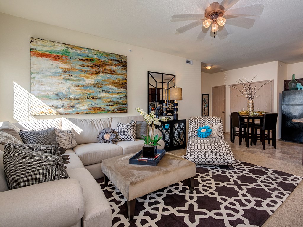 a living room with couches and a coffee table