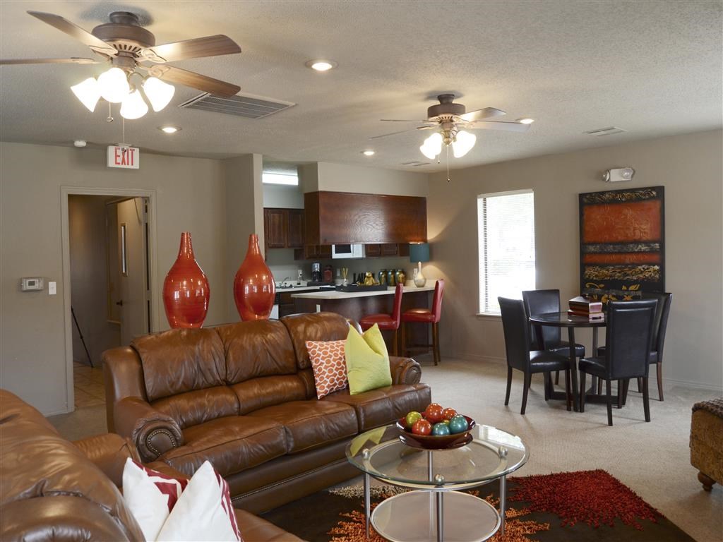 a living room with a couch and a table