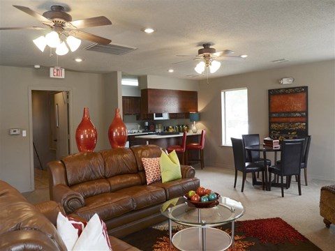 a living room with a couch and a table