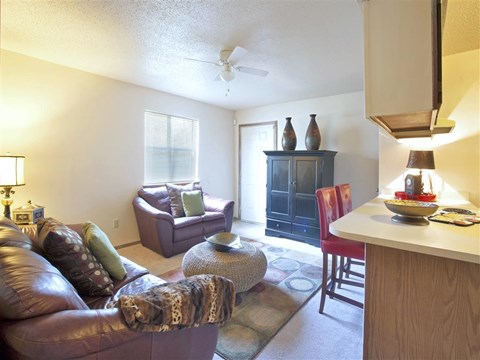 a living room with a couch and a table