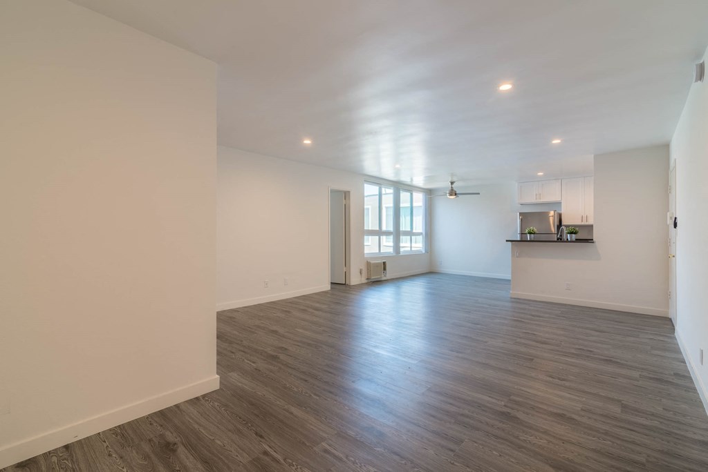 Dining area with kitchen and large window view