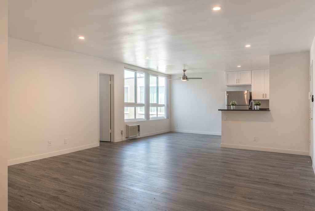 Dining area with kitchen and large window view