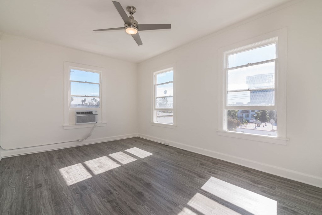 Living area with 3 large windows
