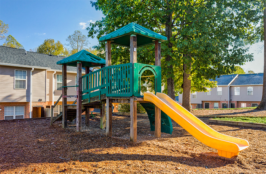 Playground with slide and climbing course at Bethabara Pointe