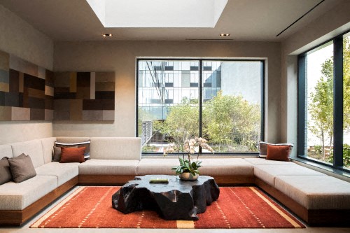 a living room with a couch and a table