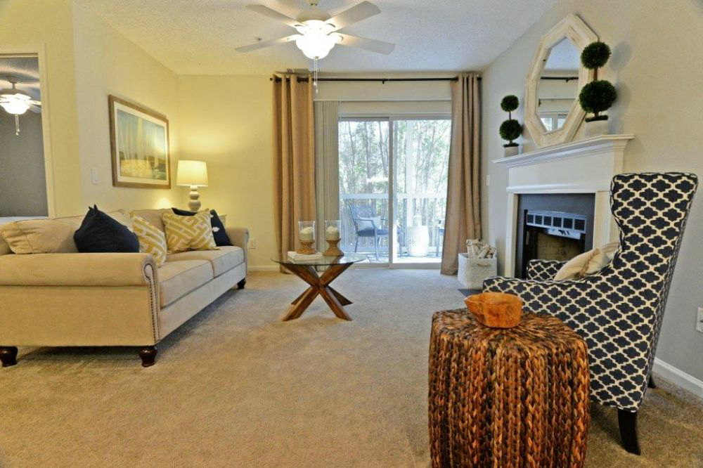 a living room with a couch and a chair