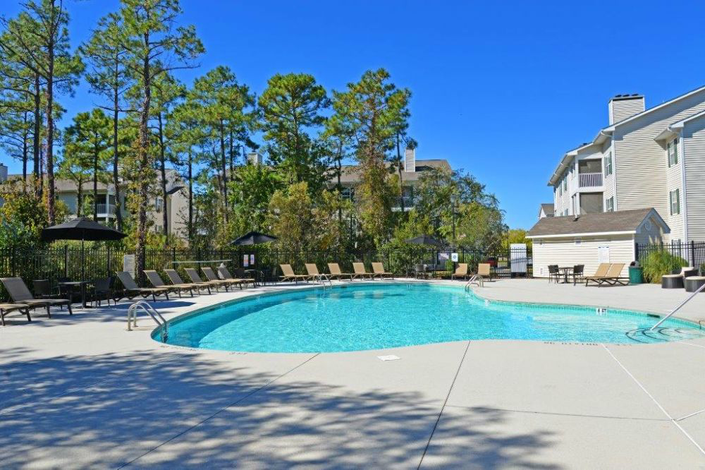 the swimming pool at the apartments for rent