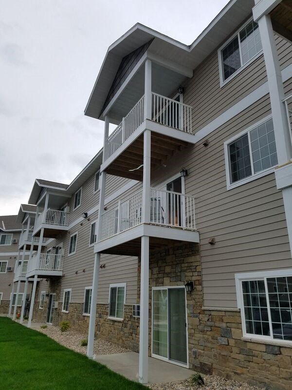 a building with a balcony on the side of it