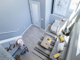 a living room with a couch and a table