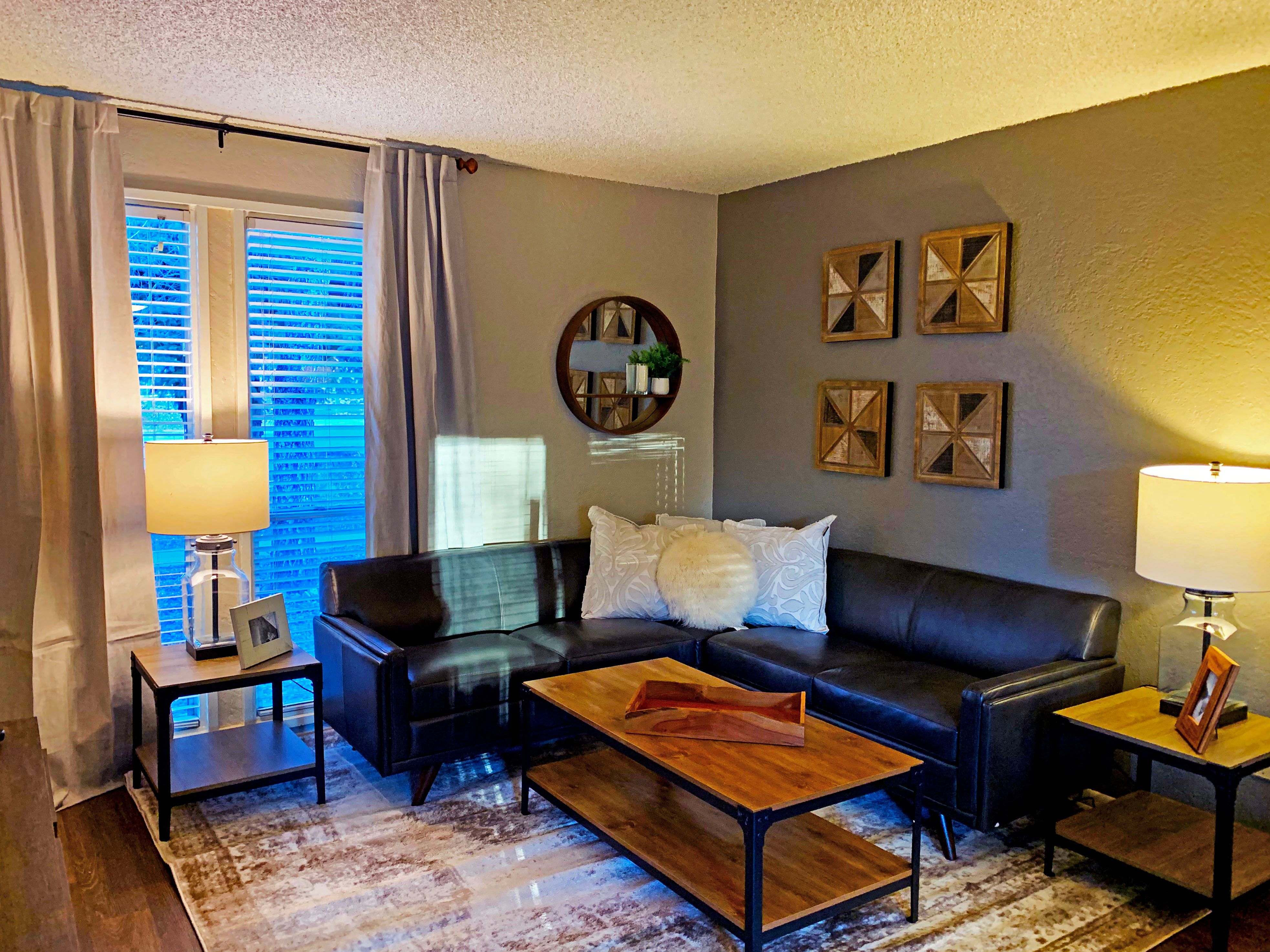 a living room with a couch and a coffee table