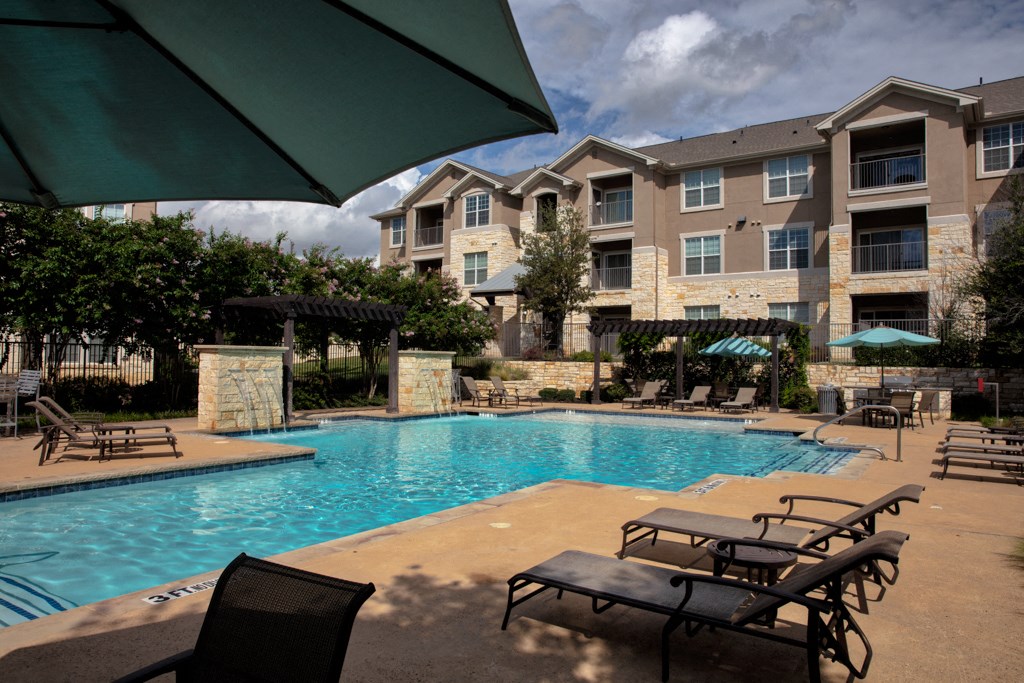 our apartments have a large pool and lounge chairs