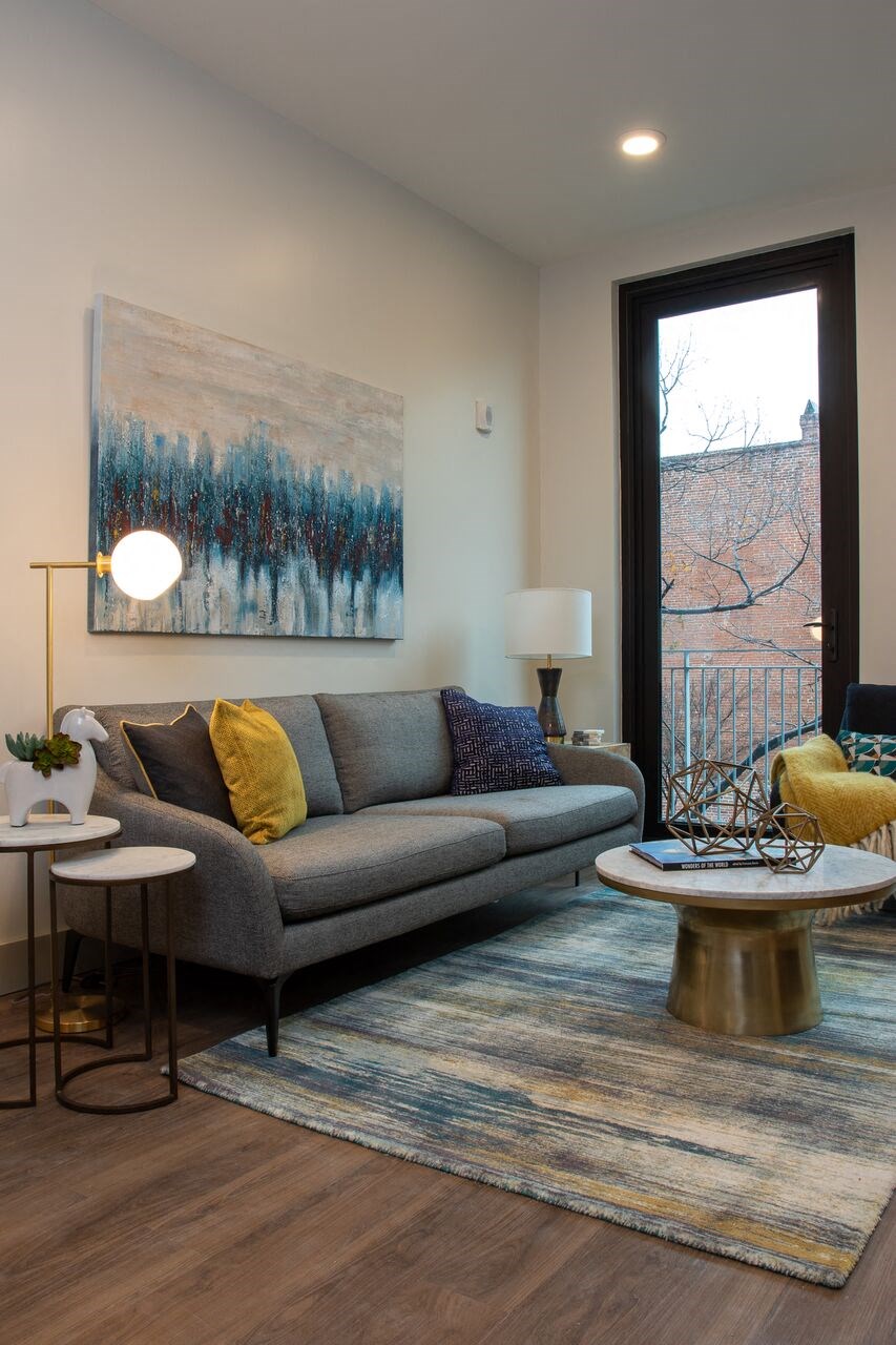 a living room with a couch and a table