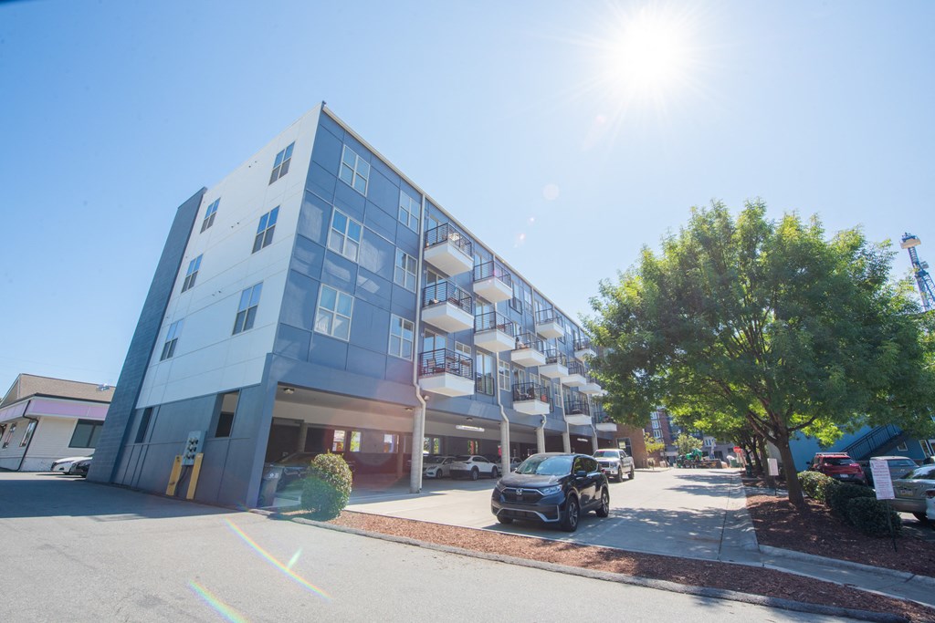 a large building with a car parked in front of it