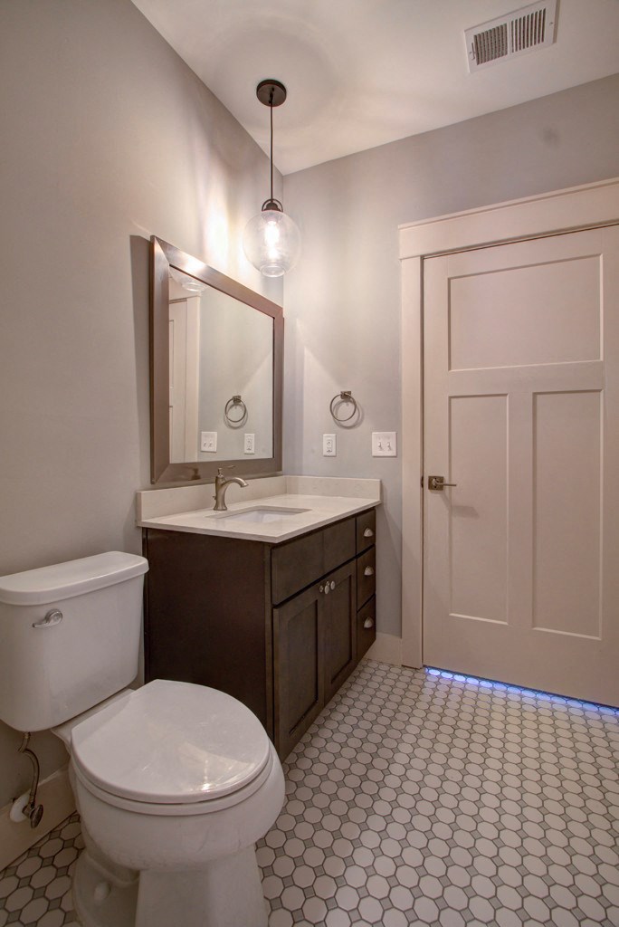 a small bathroom with a toilet and a sink
