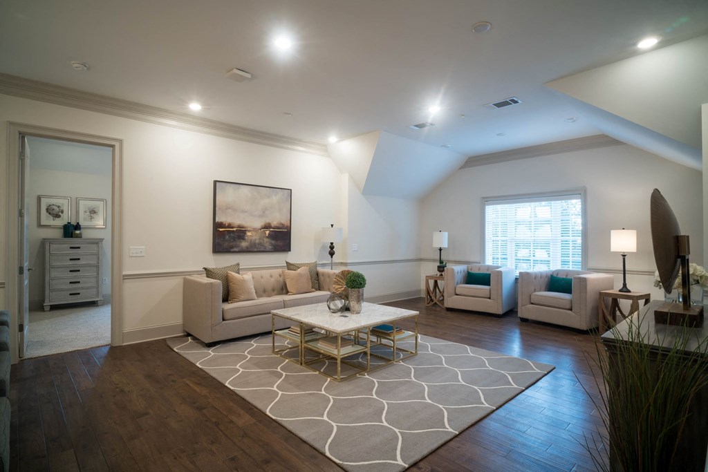 a living room with couches and a table