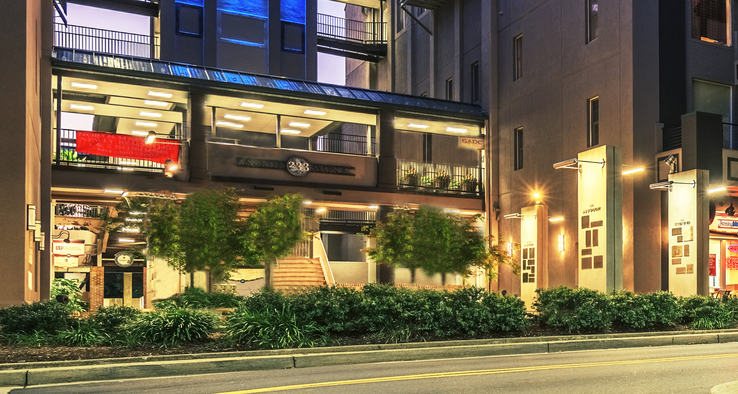 a night view of the outside of a building at night