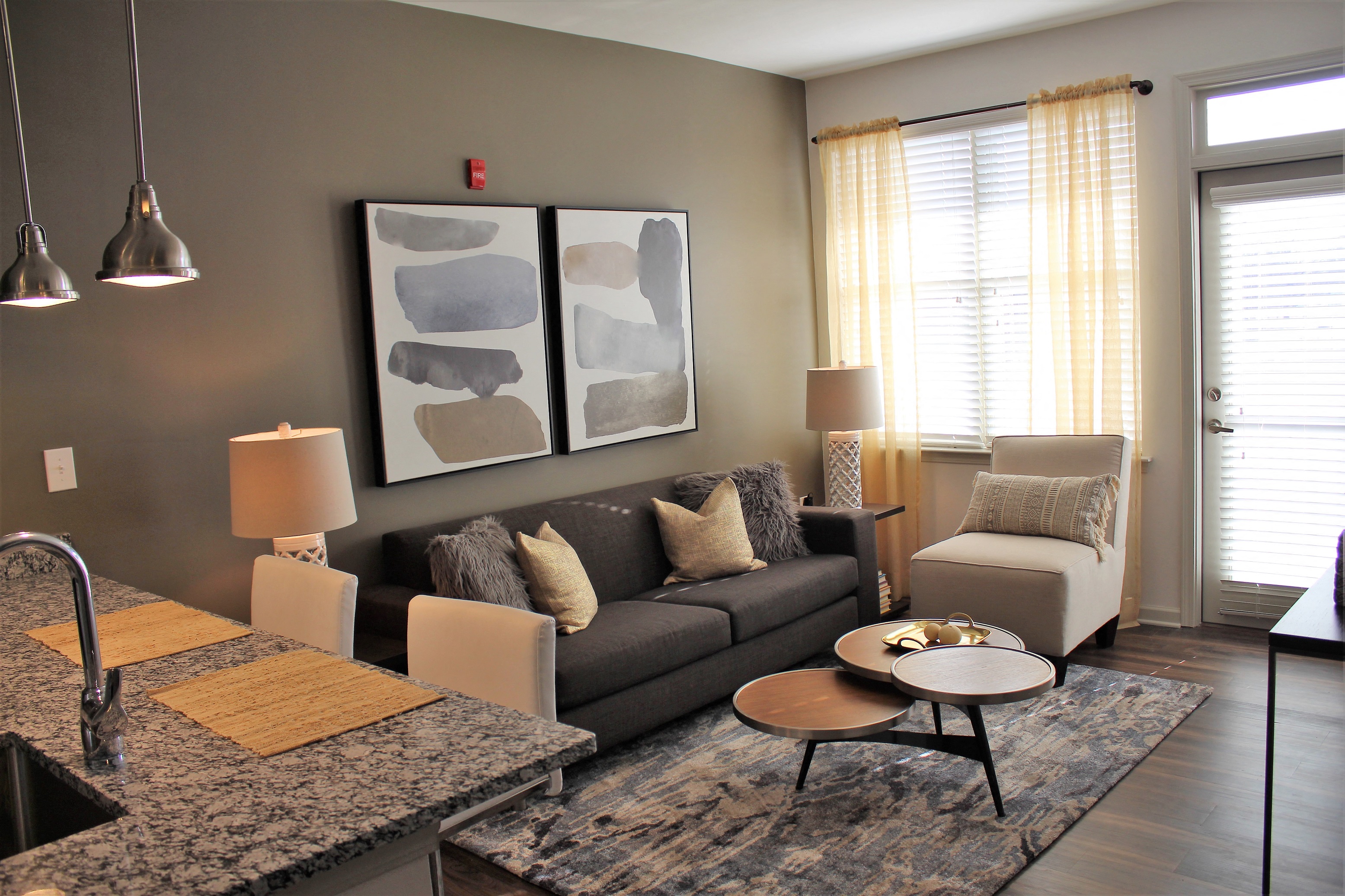 a living room with a couch and a table