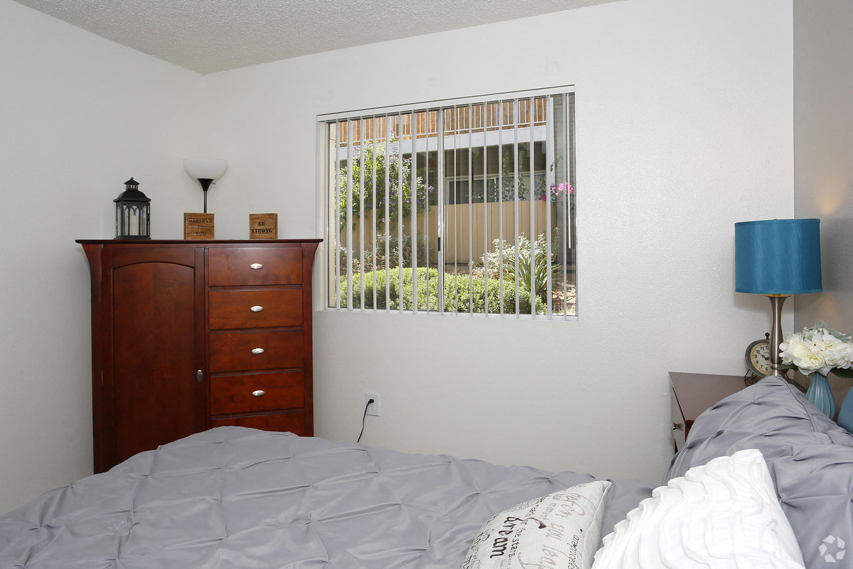 Model Master Bedroom with window and dresser