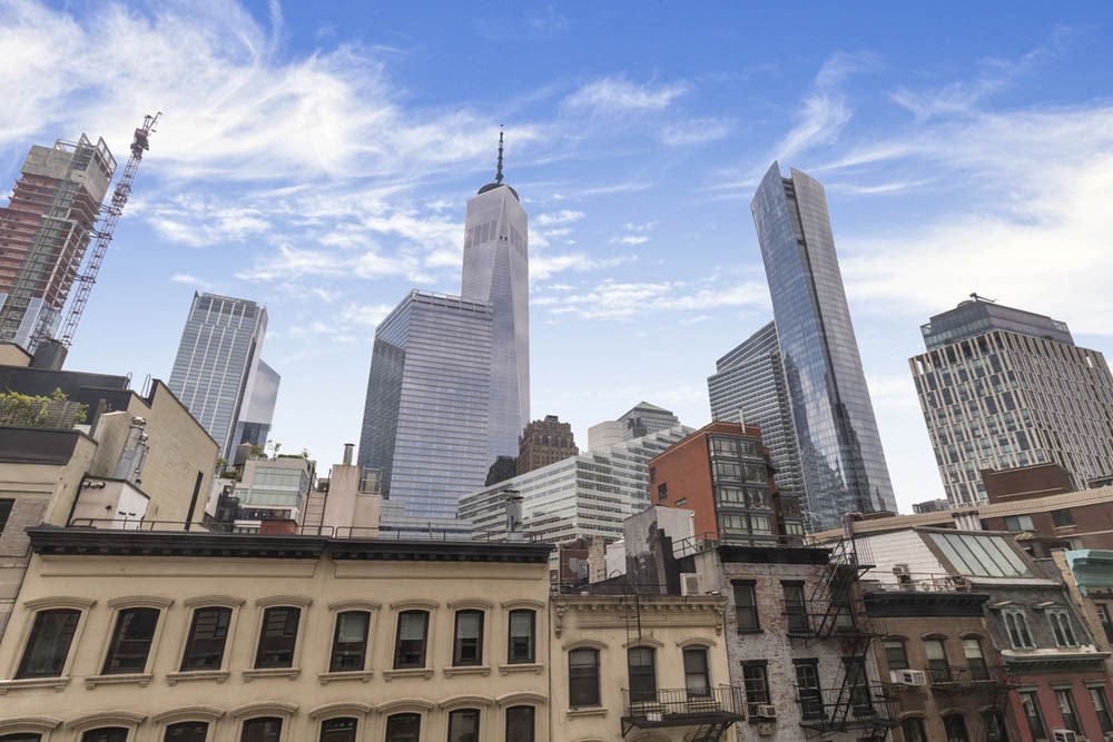 a view of the city from the roof of a building