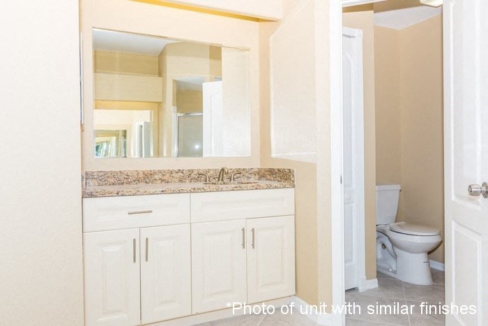 A photo of a unit with similar finishes to the one in the picture.