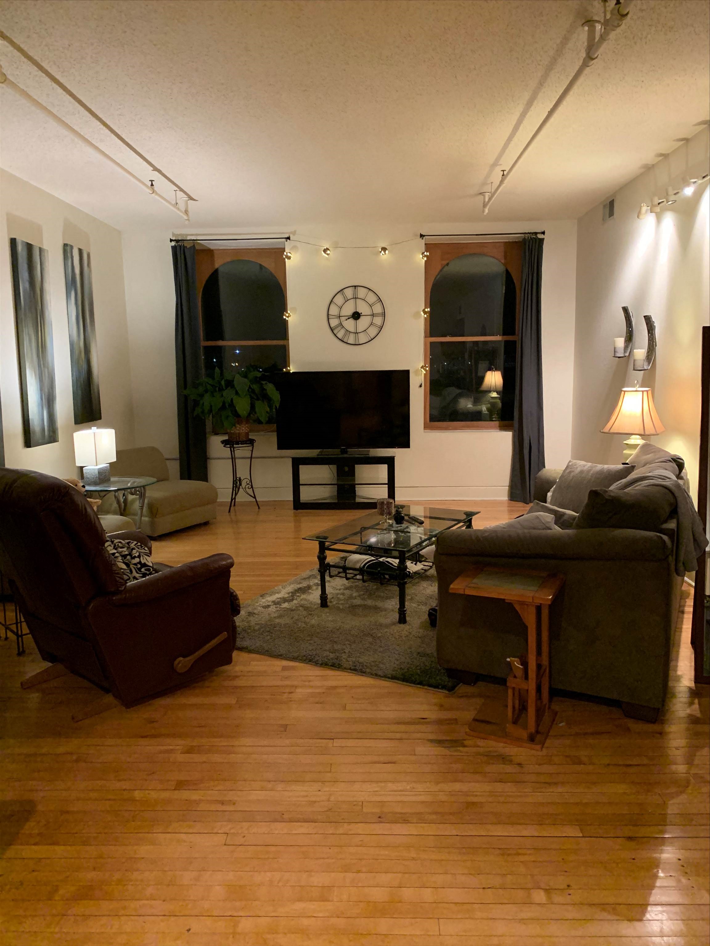 the living room is clean and ready for us to use