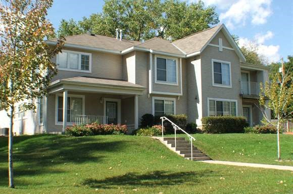 a house with stairs in front of it