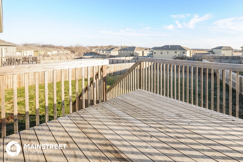 the view from the deck of the boardwalk of the beach