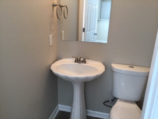 a small bathroom with a sink and a toilet
