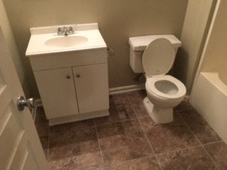 a small bathroom with a toilet and a sink