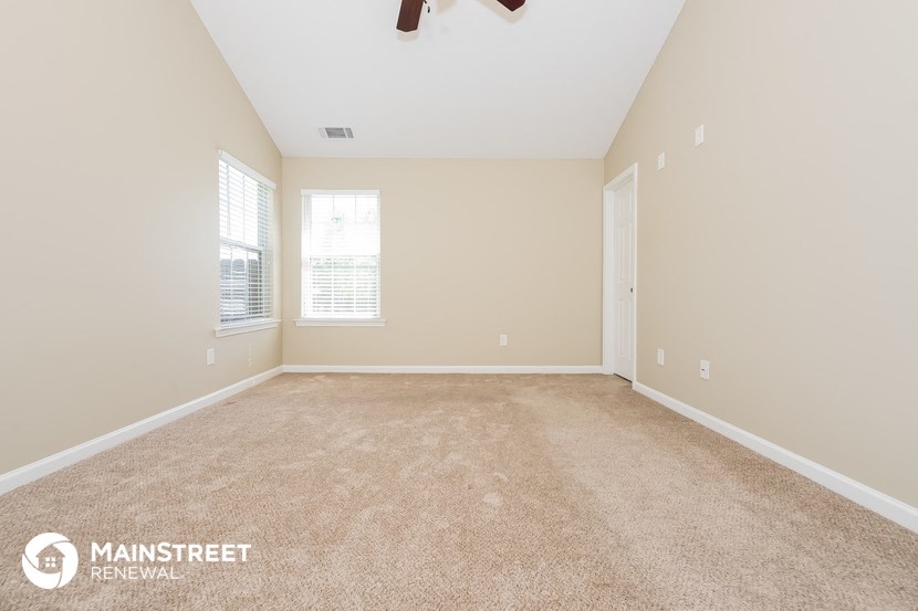 the spacious living room is clean and ready for you to use