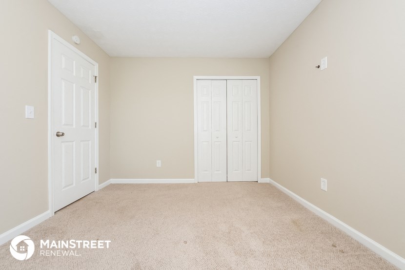 the upstairs bedroom is clean and ready to be used as a home office