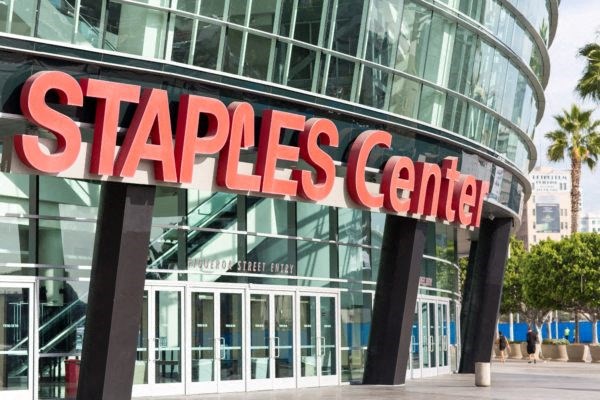 The Staples Center is a large, modern building with a glass facade.