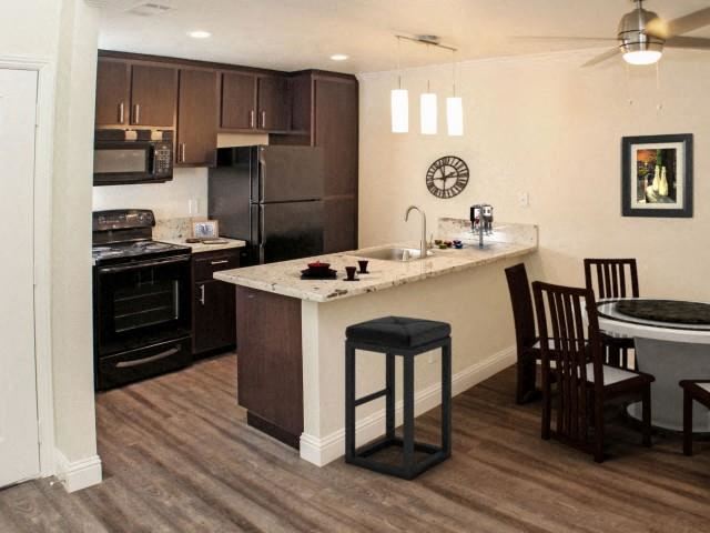 Kitchen and dining l Eclipse 96 Apartments in Fair Oaks CA