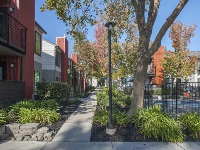 Sidewalk exterior building l Eclipse 96 Apartments in Fair Oaks CA