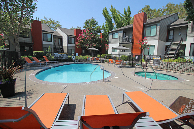 Pool and lounge chairs l Eclipse 96 Apartments in Fair Oaks CA