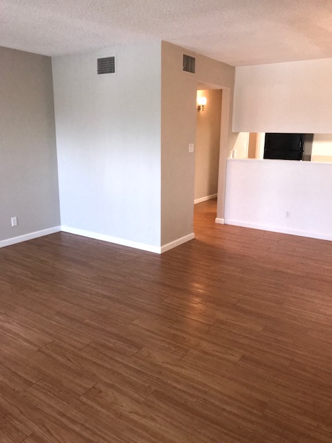 Living Room near kitchen l Forest Glenn Apartments in East Vallejo CA