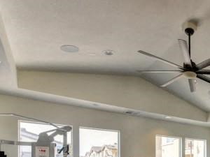 Chico California Apartments for Rent-Eaton Village-Fitness Center with Equipment, Large Windows, and a Ceiling Fan