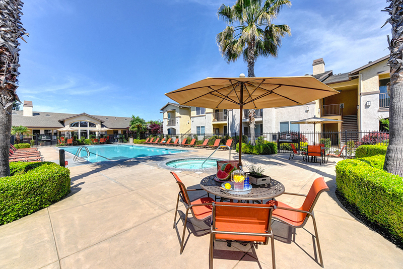 Pool and lounge chairs l Eaton Village Apartments in Chico CA 