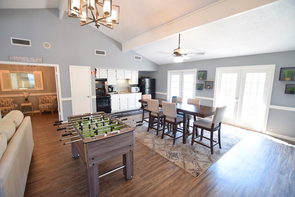 the view of the living room and dining room from the kitchen and living room area
