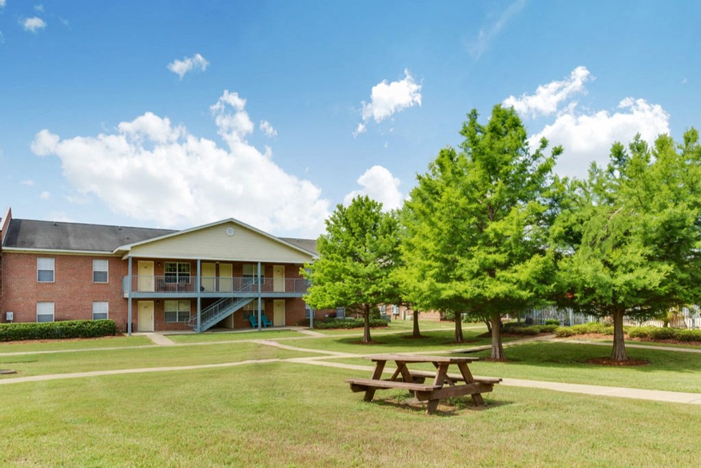 our apartments are located in the community with a picnic table