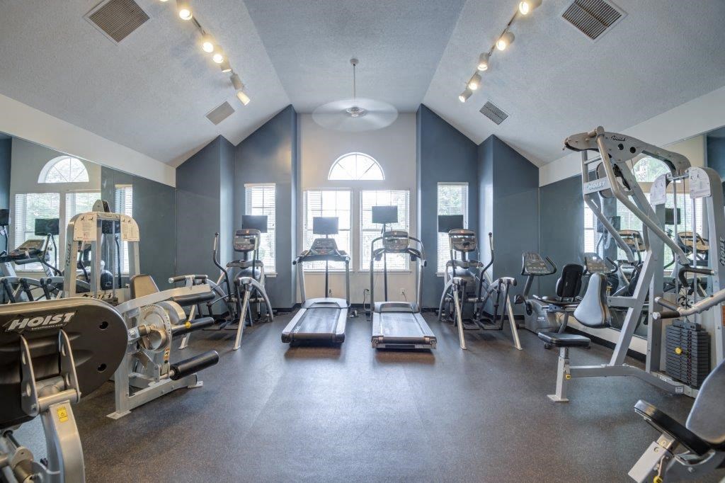 the gym is equipped with a variety of exercise equipment