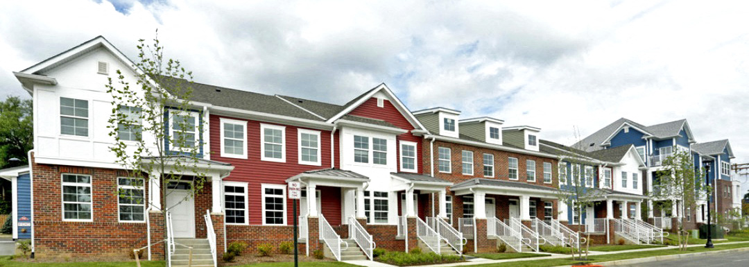 a row of town houses on a street