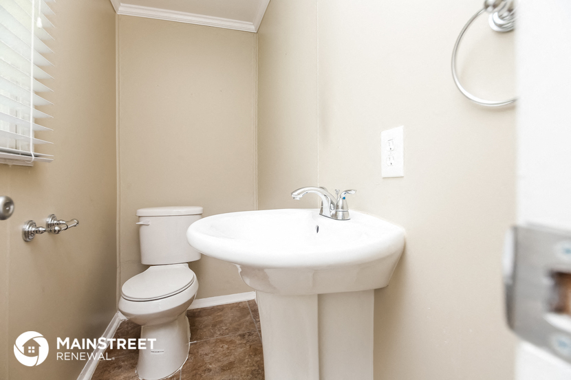 a small bathroom with a sink and a toilet