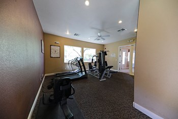 Fitness center at Villanova Apartments - Photo Gallery 7