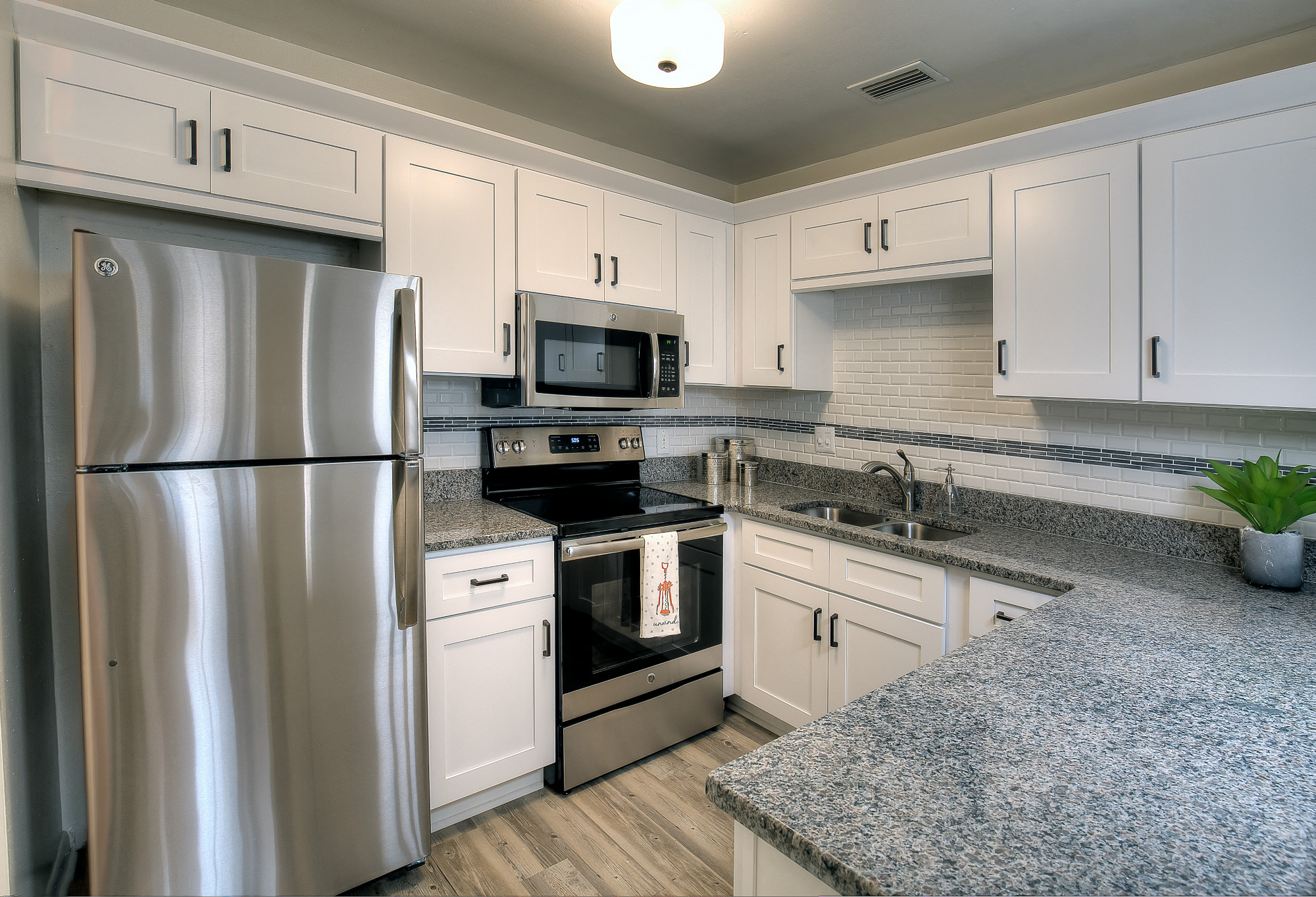 Most kitchens feature Shaker-style cabinetry, granite countertops, and stainless steel appliances.